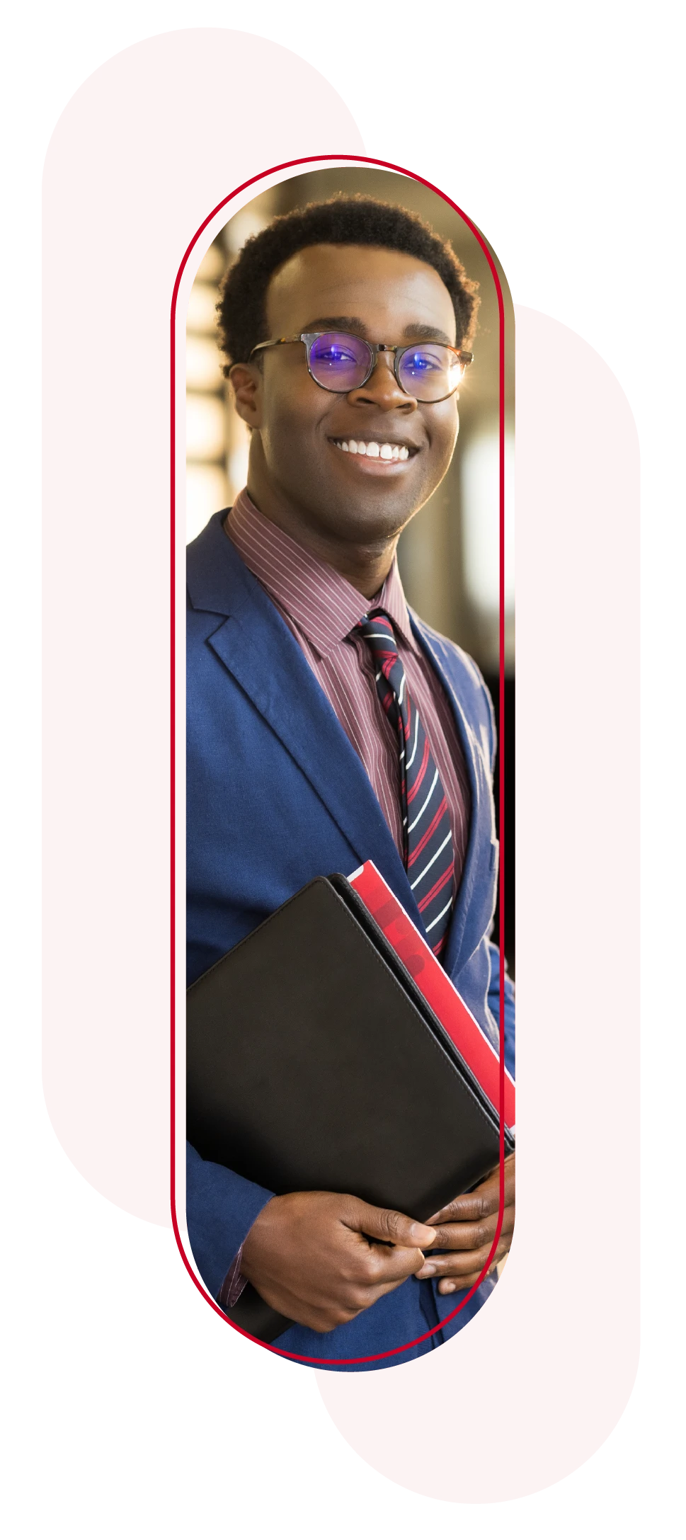 Account Manager smiling with folder in his hand.